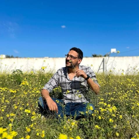 people sitting around a table in collab