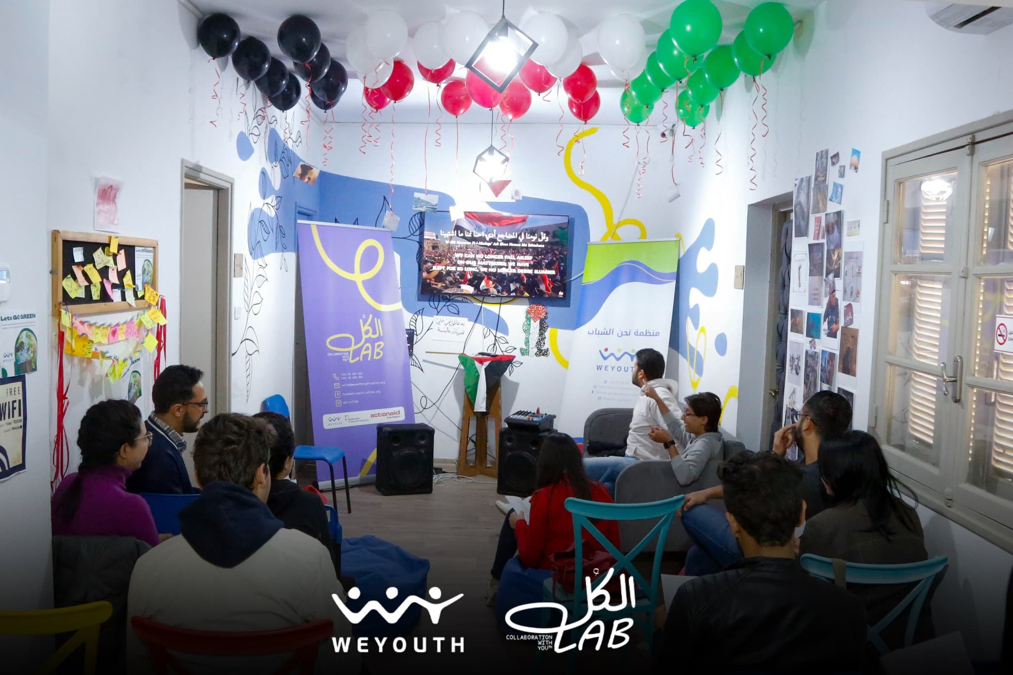 people sitting around a table in collab